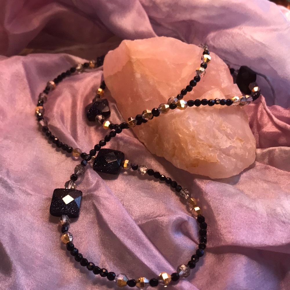 Long infinity beaded necklace